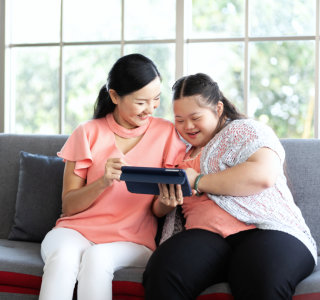 woman and girl sitting