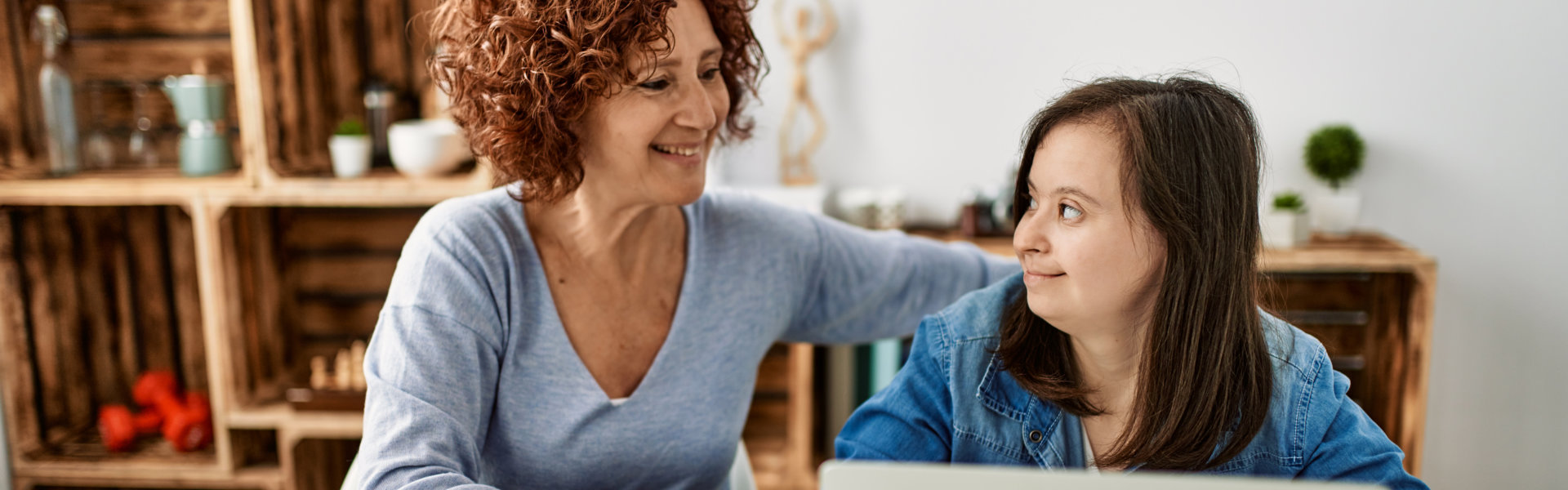 woman and girl smilling