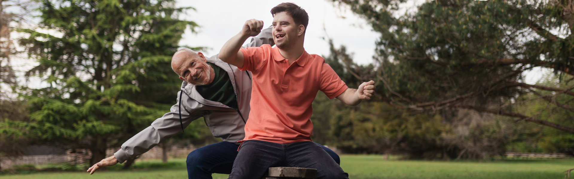 man and boy playing